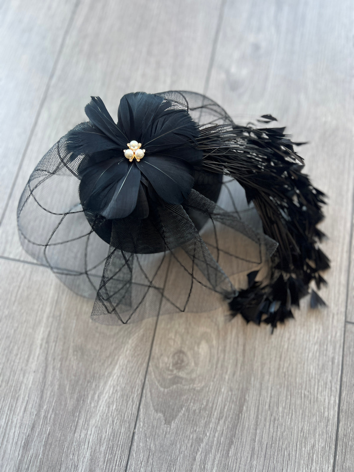 Black Pillbox Fascinator With An Array Of Feathers &amp; Feather Flower With Pearl Detail