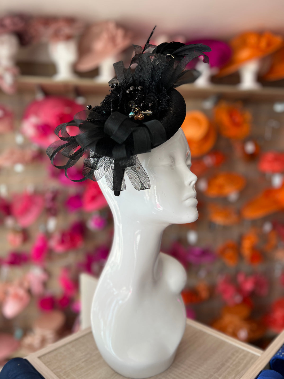 Pillbox Hat With Loops and  Embellished Flowers- Black