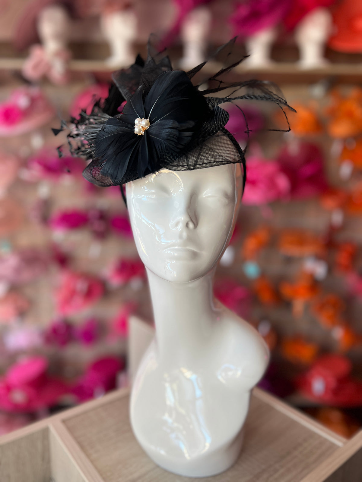 Black Pillbox Fascinator With An Array Of Feathers &amp; Feather Flower With Pearl Detail