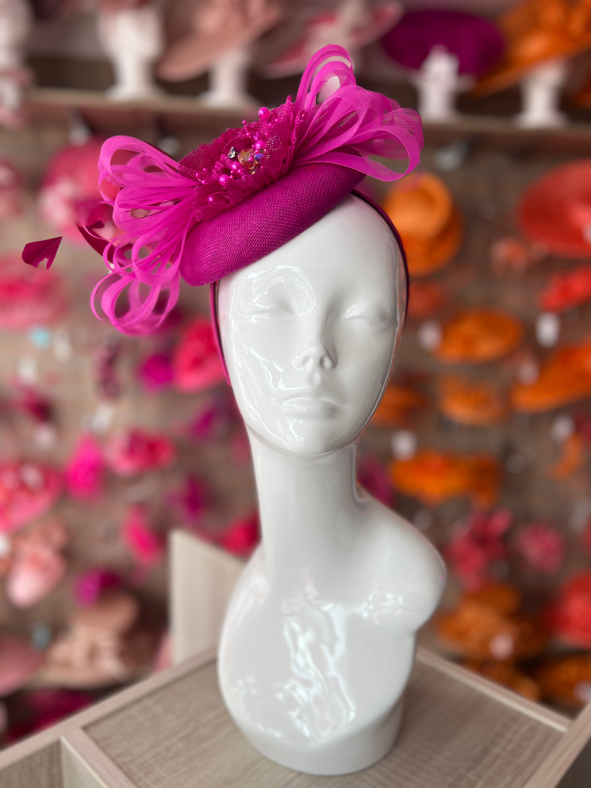 Pillbox Hat With Loops and  Embellished Flowers-Fuchsia