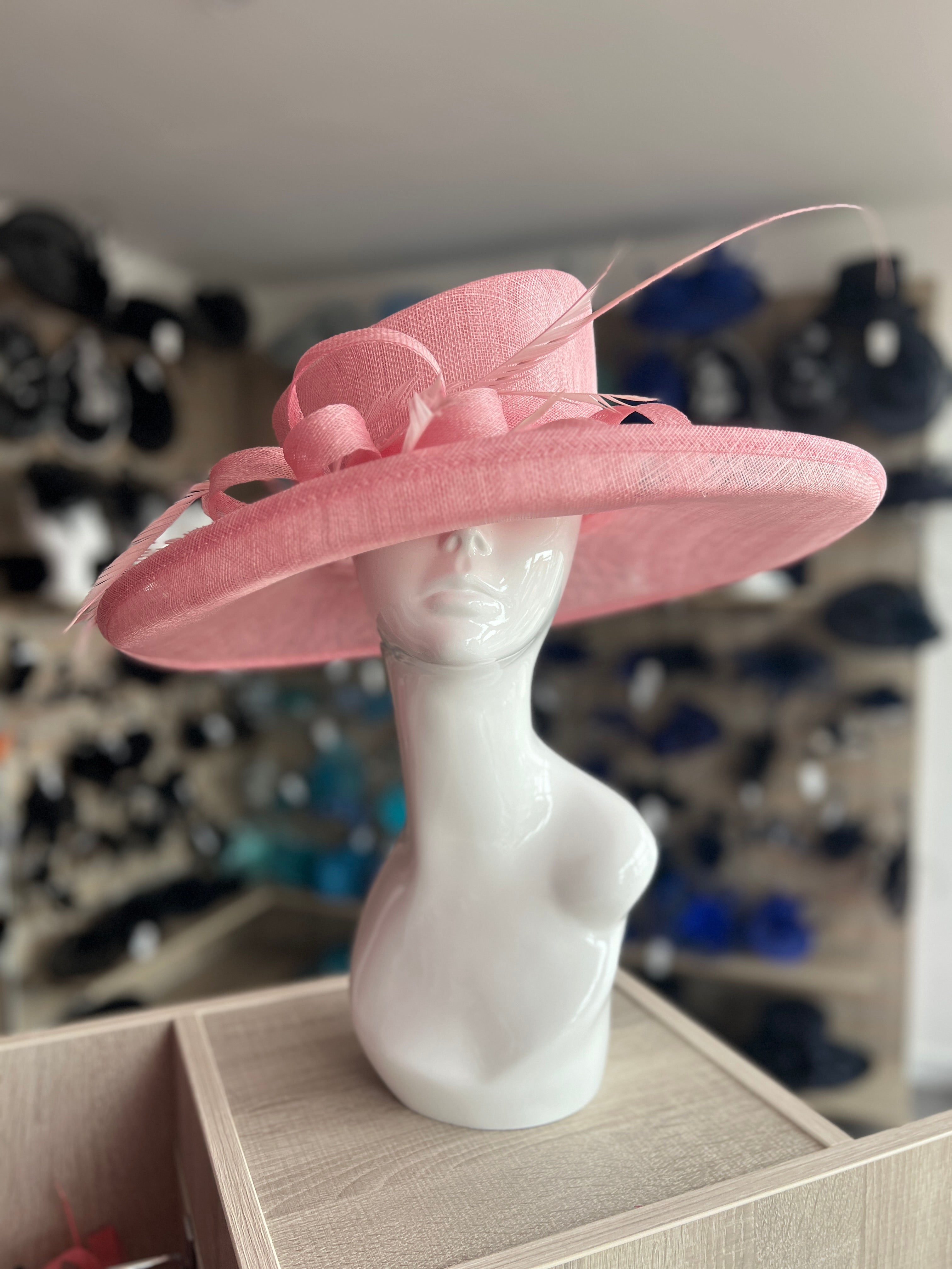 Pale pink wedding hat on sale