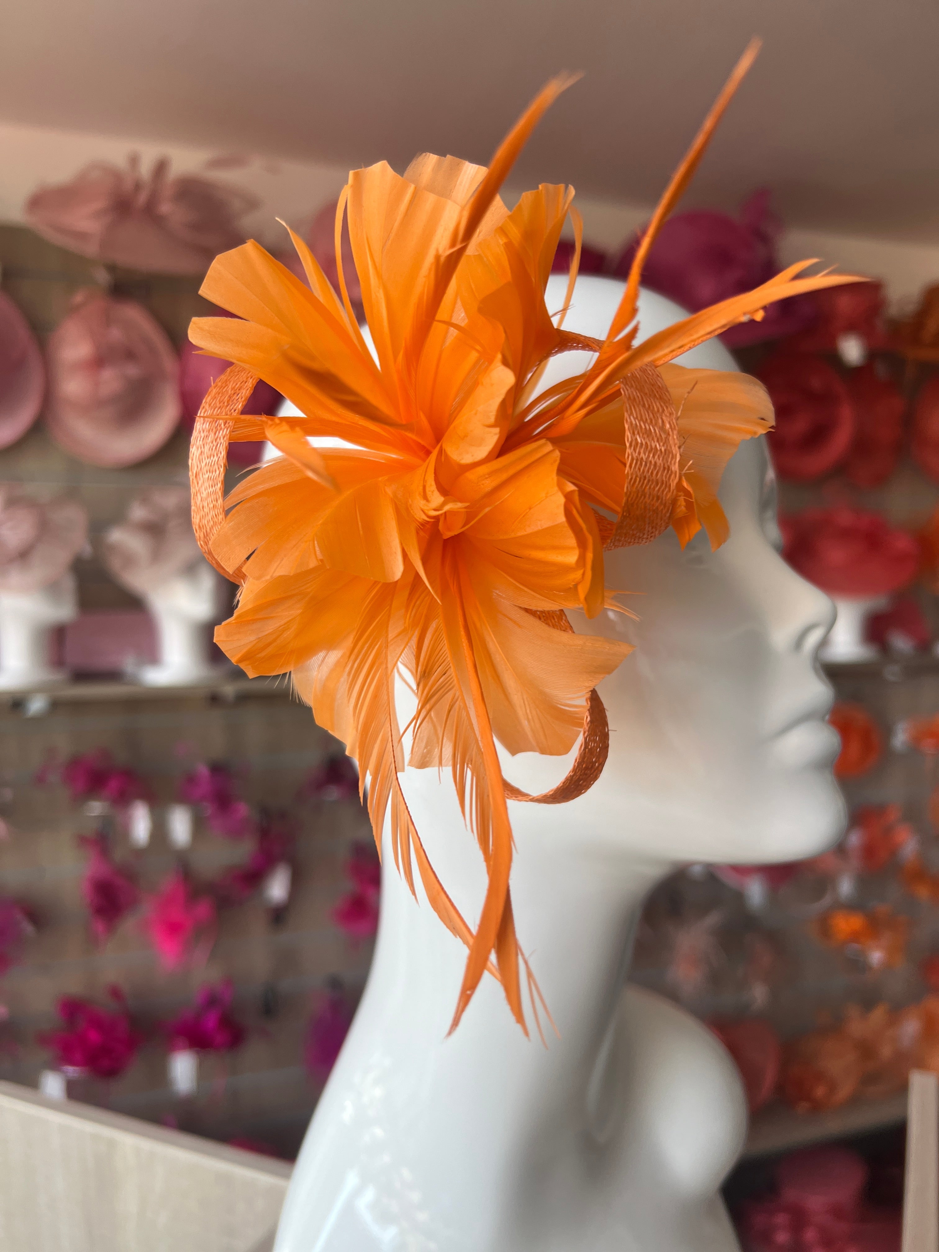 Clip On Orange Fascinator with Loops Feather Flower