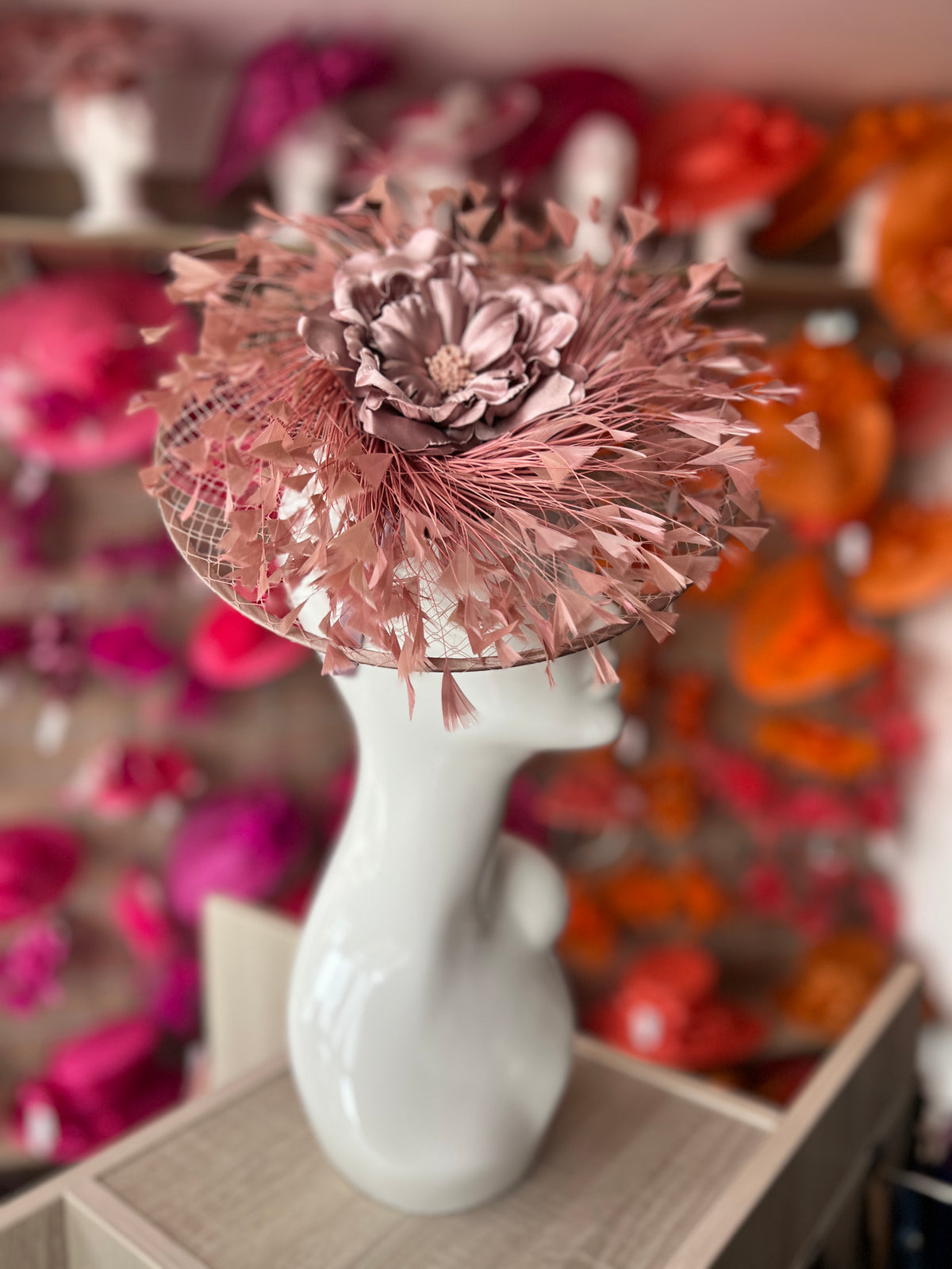 Dusky Pink Saucer Hatinator With Array Of Feathers &amp; Satin Flower-Fascinators Direct