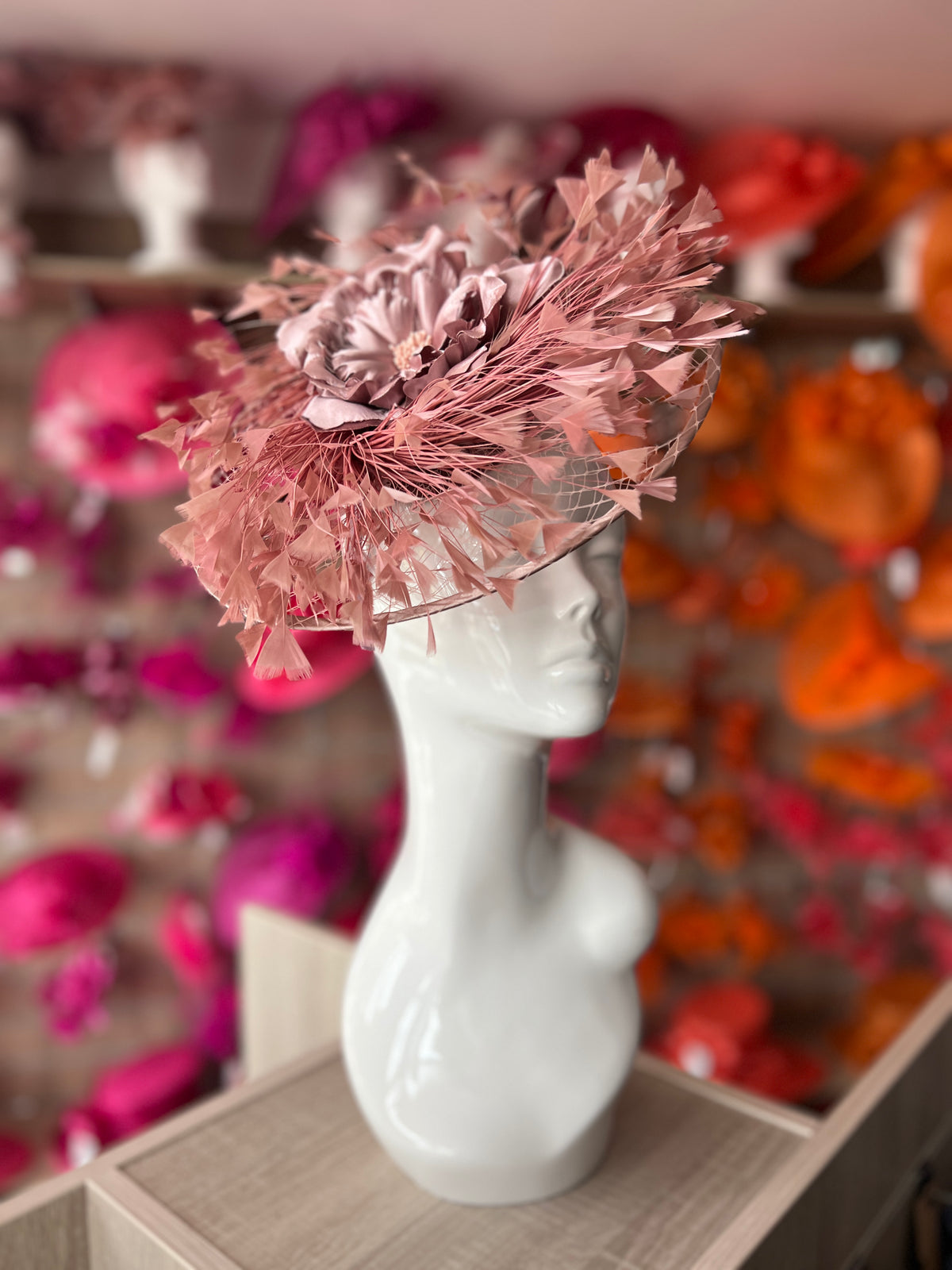 Dusky Pink Saucer Hatinator With Array Of Feathers &amp; Satin Flower-Fascinators Direct