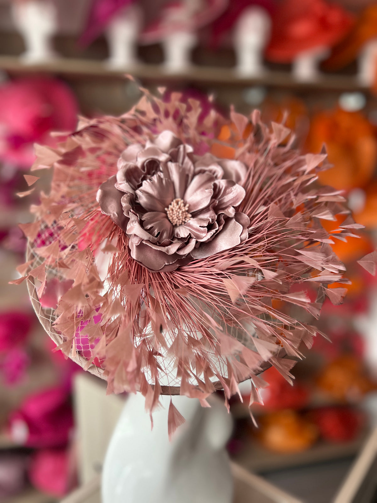 Dusky Pink Saucer Hatinator With Array Of Feathers &amp; Satin Flower-Fascinators Direct