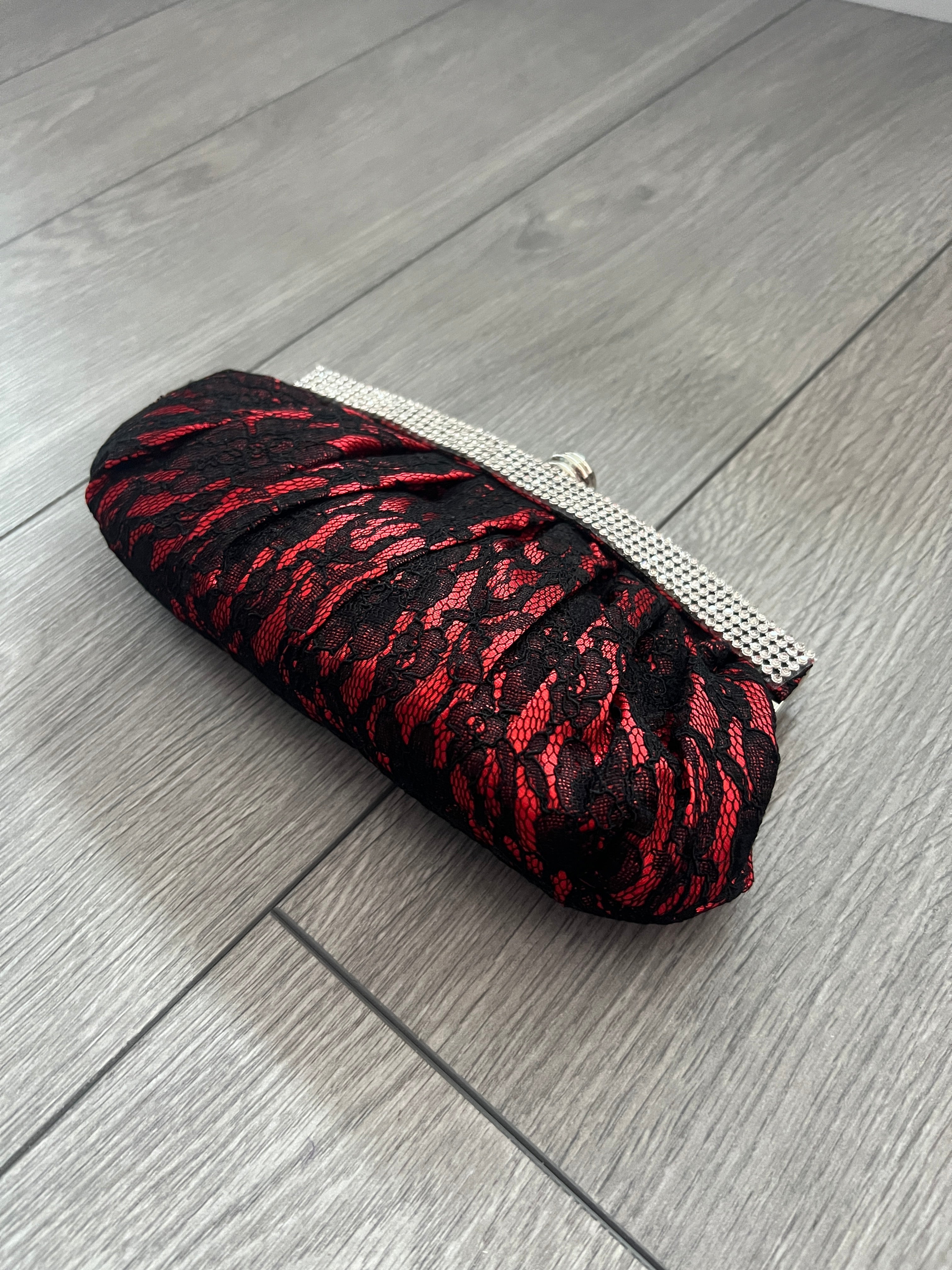 Black and red clutch bag online