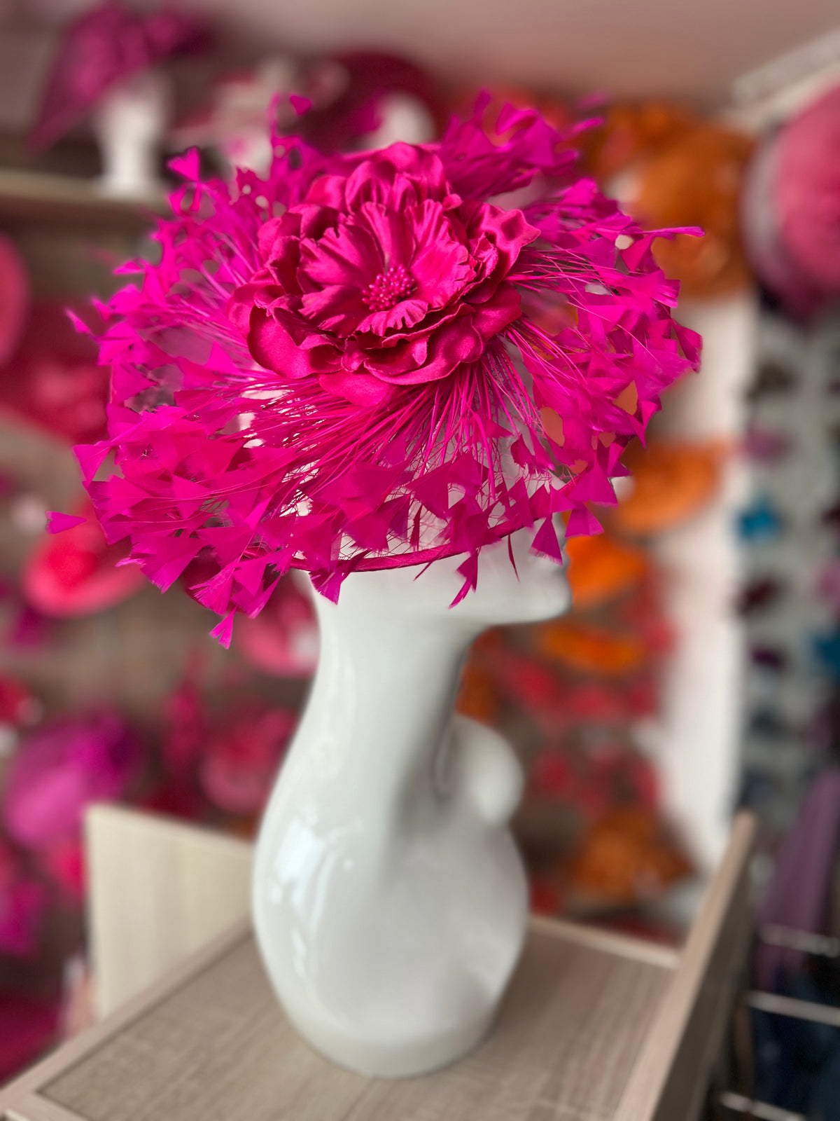 Fuchsia Saucer Hatinator With Array Of Feathers &amp; Satin Flower-Fascinators Direct