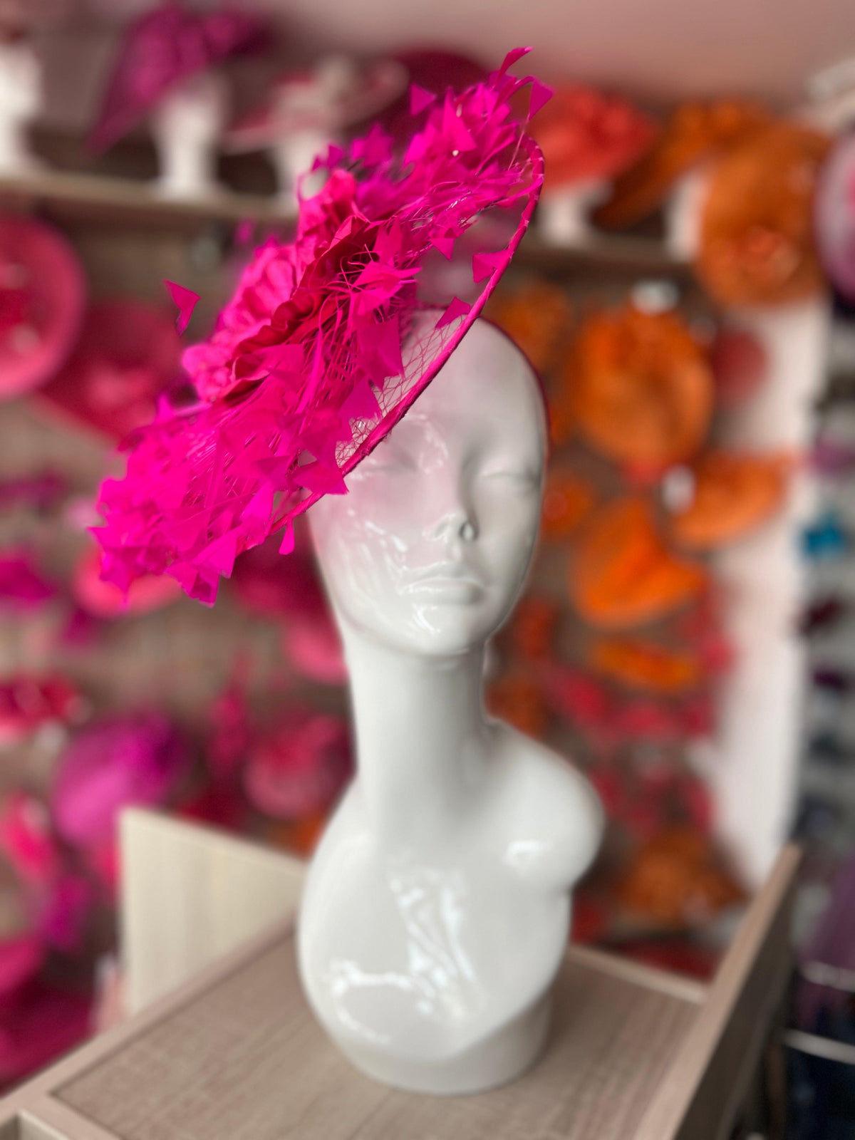 Fuchsia Saucer Hatinator With Array Of Feathers &amp; Satin Flower-Fascinators Direct