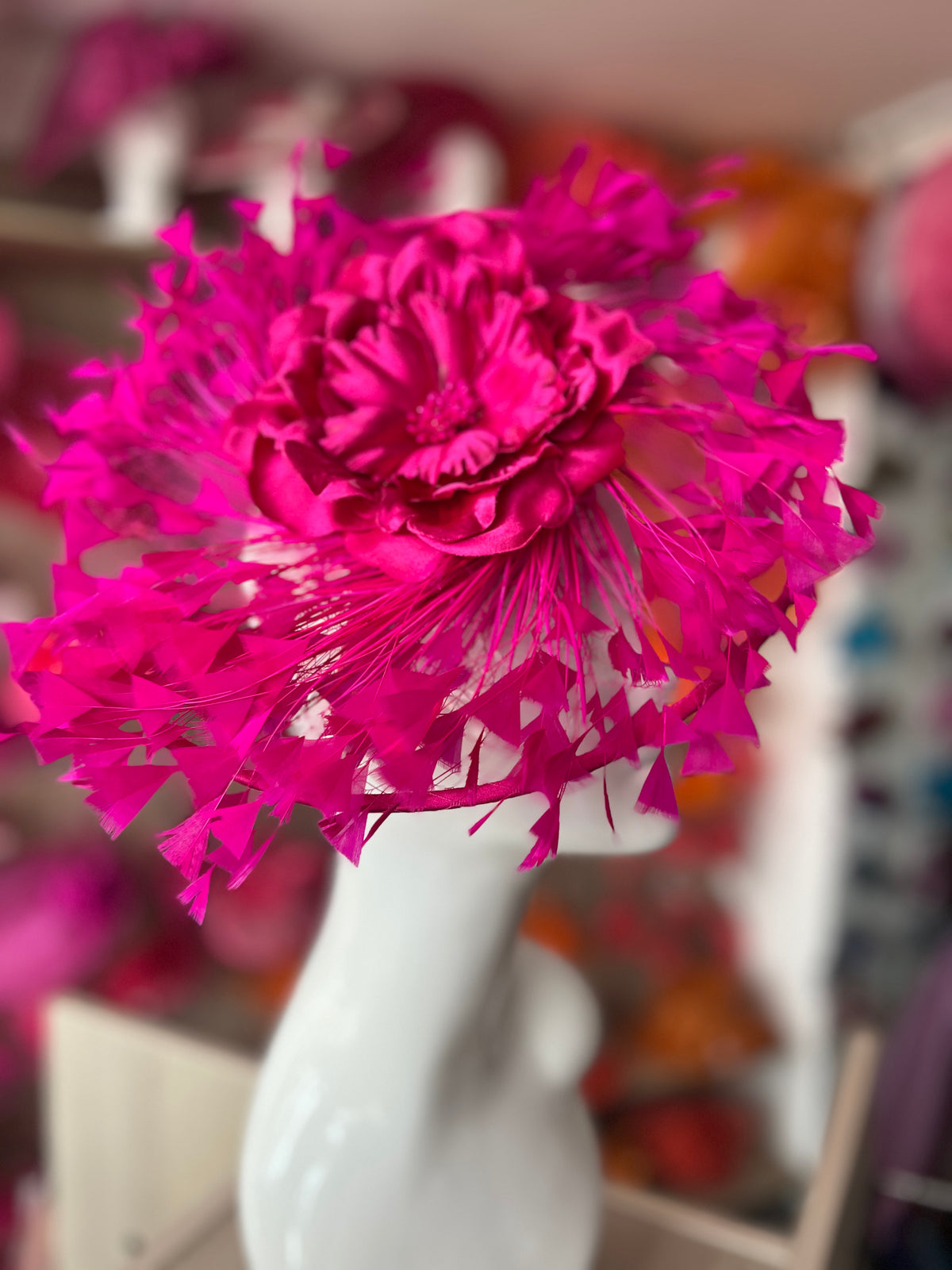 Fuchsia Saucer Hatinator With Array Of Feathers &amp; Satin Flower-Fascinators Direct
