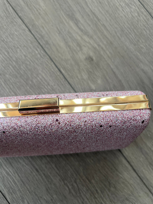 Pink and silver clutch bag on sale