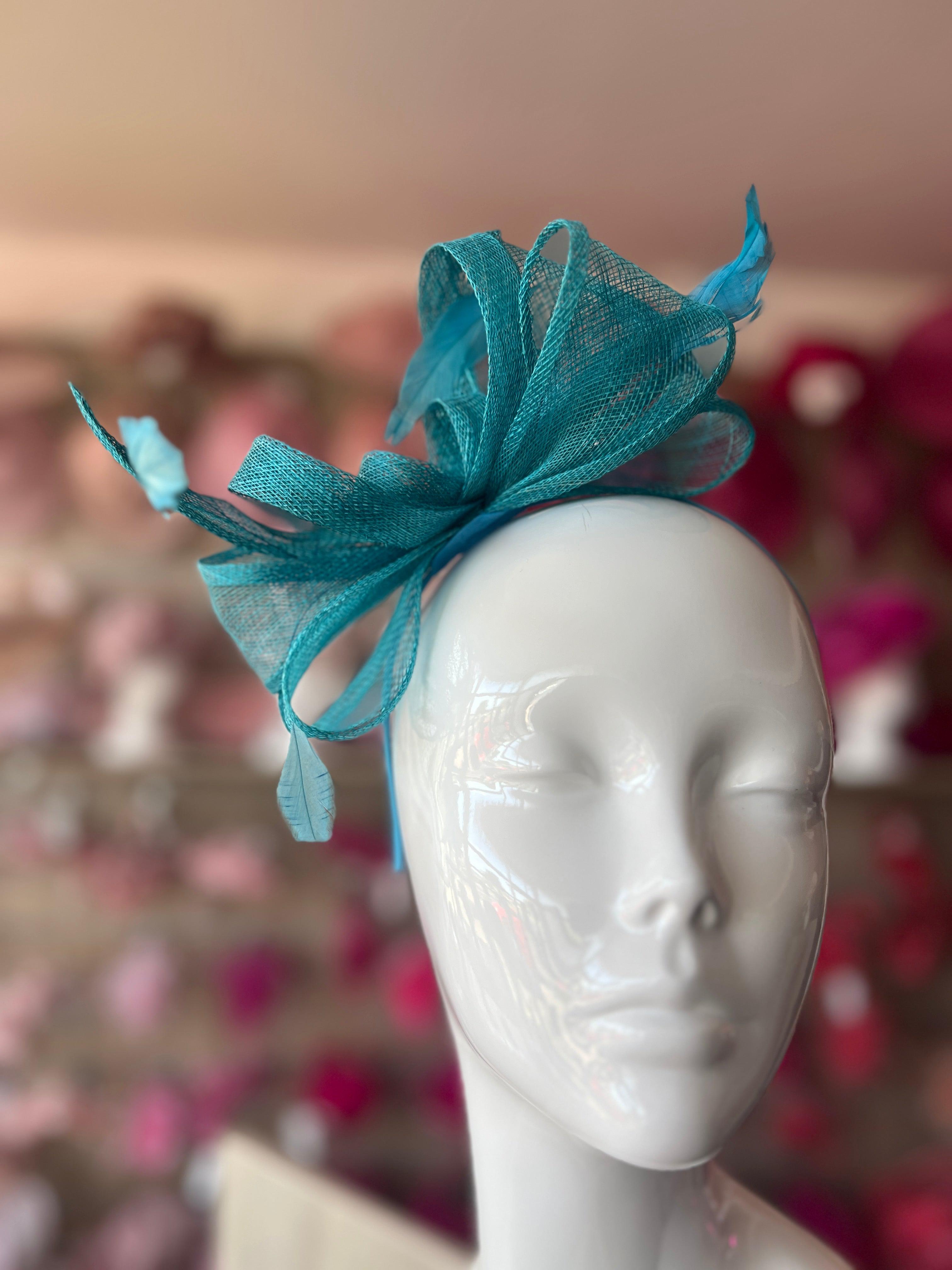 New turquoise fascinator with 2024 white netting and barb quills on a headband! Made to order!