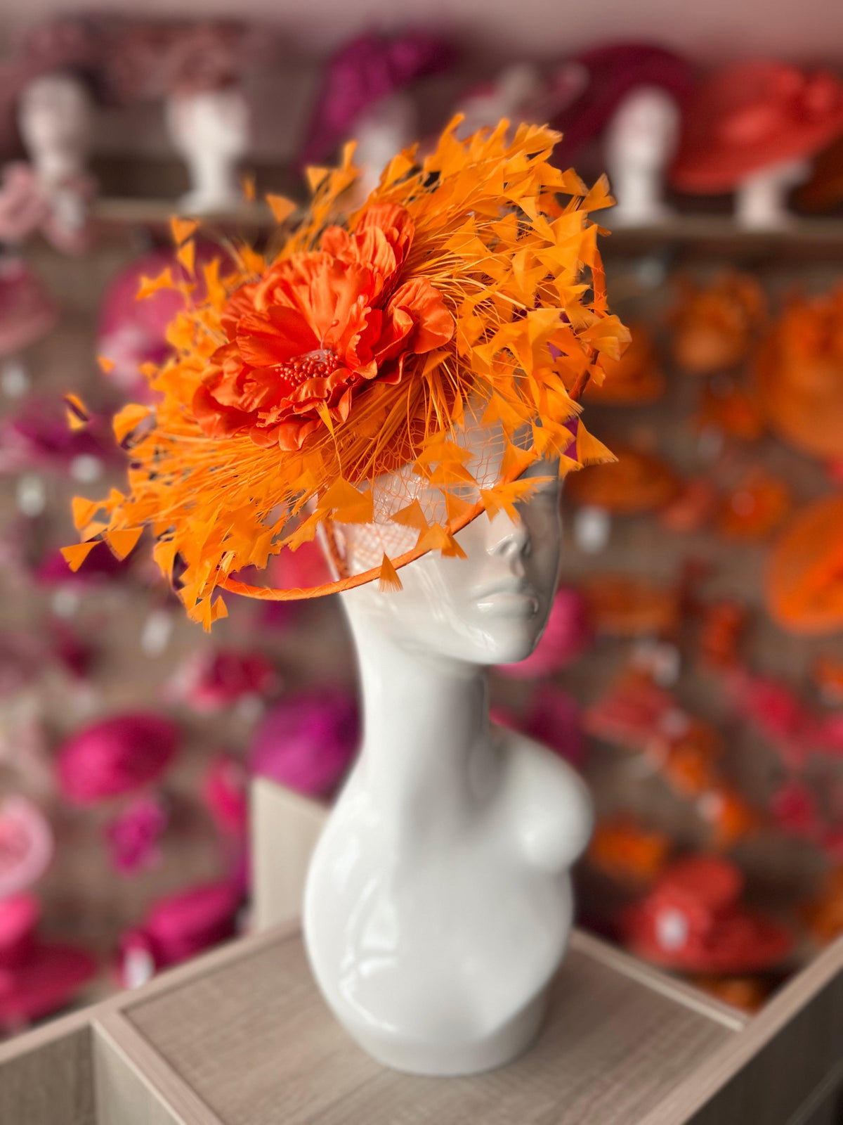 Orange Saucer Hatinator With Array Of Feathers &amp; Satin Flower-Fascinators Direct