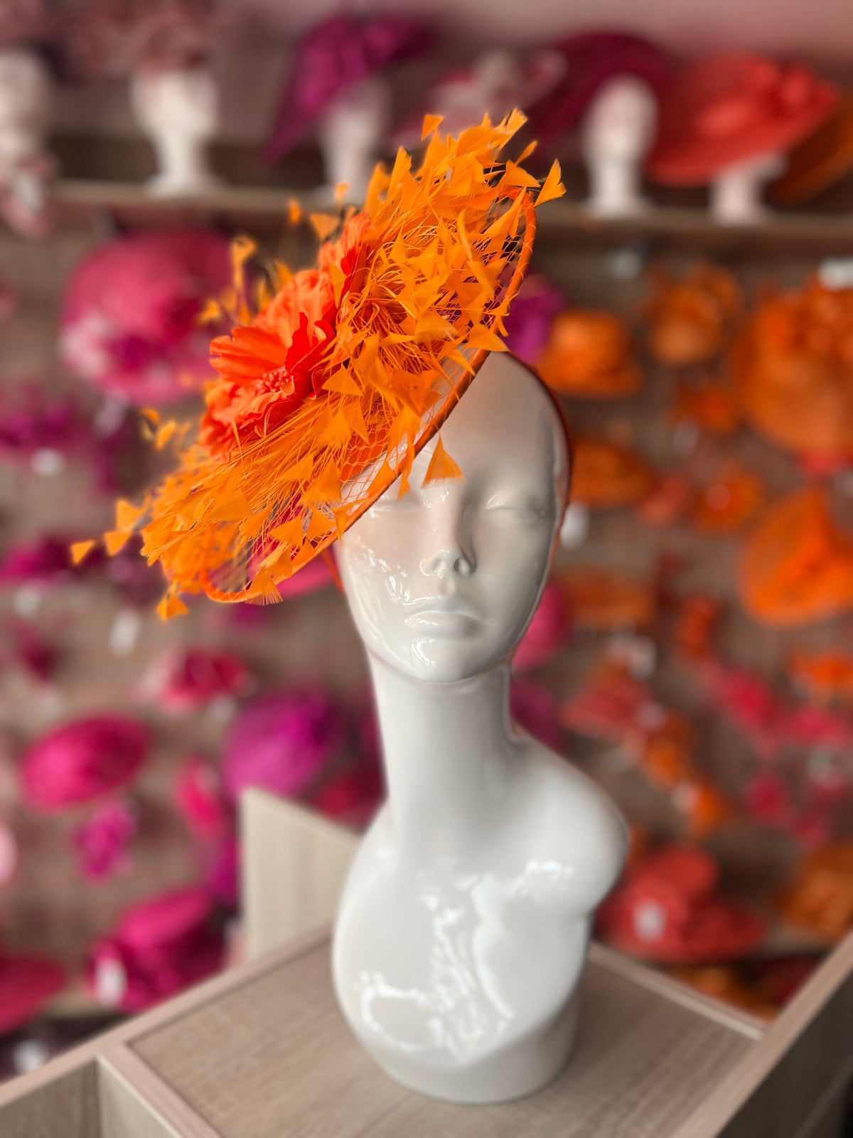 Orange Saucer Hatinator With Array Of Feathers &amp; Satin Flower-Fascinators Direct