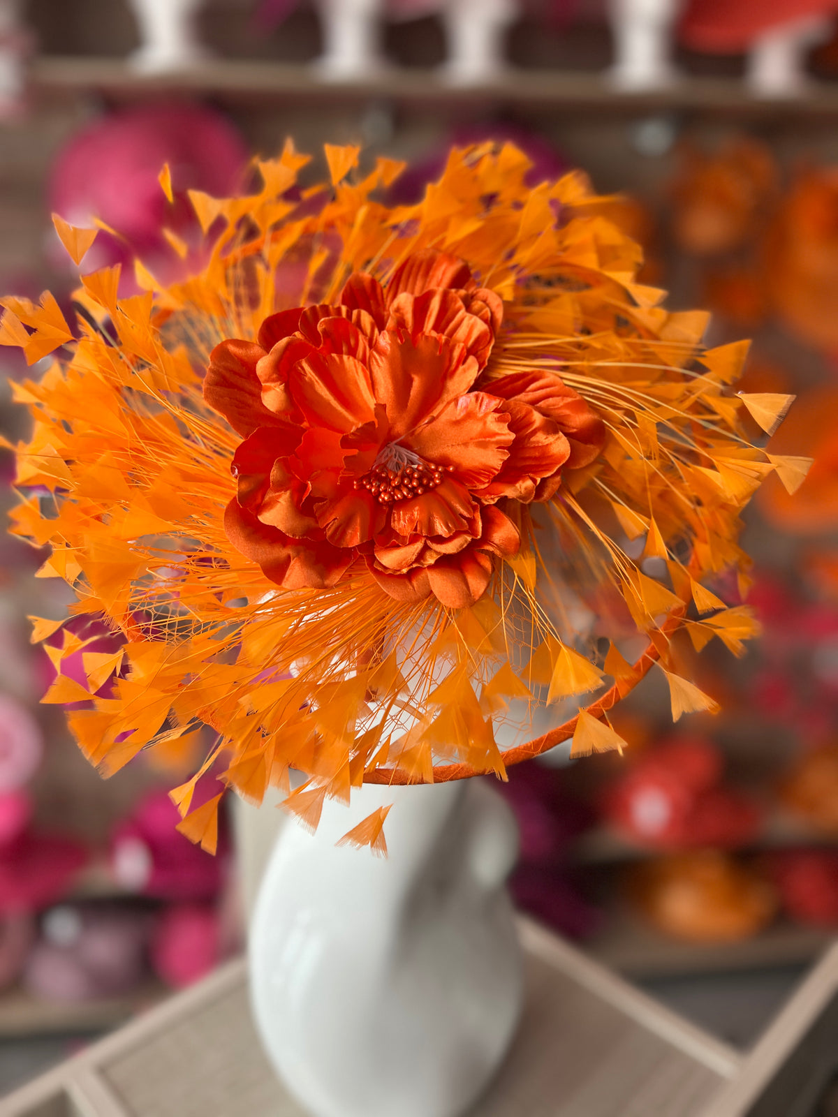 Orange Saucer Hatinator With Array Of Feathers &amp; Satin Flower-Fascinators Direct