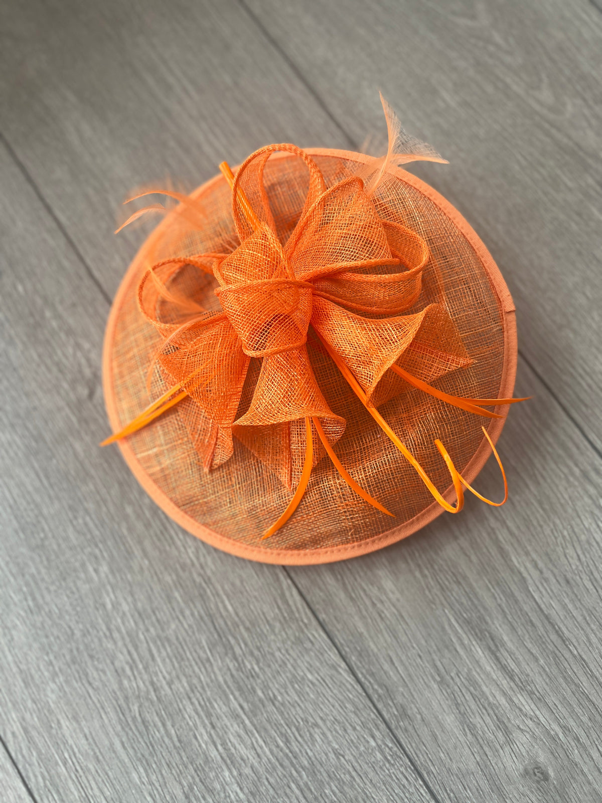 Orange Sinamay Petunia Flower Fascinator With A Saucer Base-Fascinators Direct