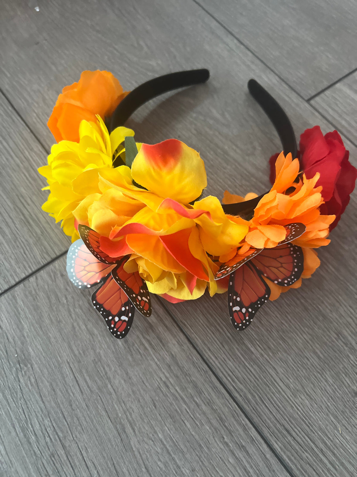 Crow selling and Flowers Fascinator in Orange and Green