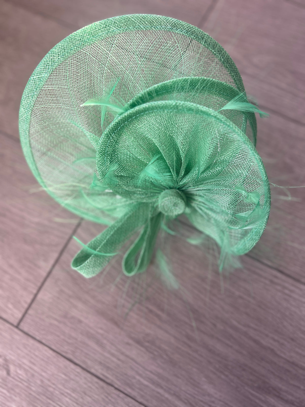 Pleated Spring Green Headband Fascinator with Wispy Feathers-Fascinators Direct