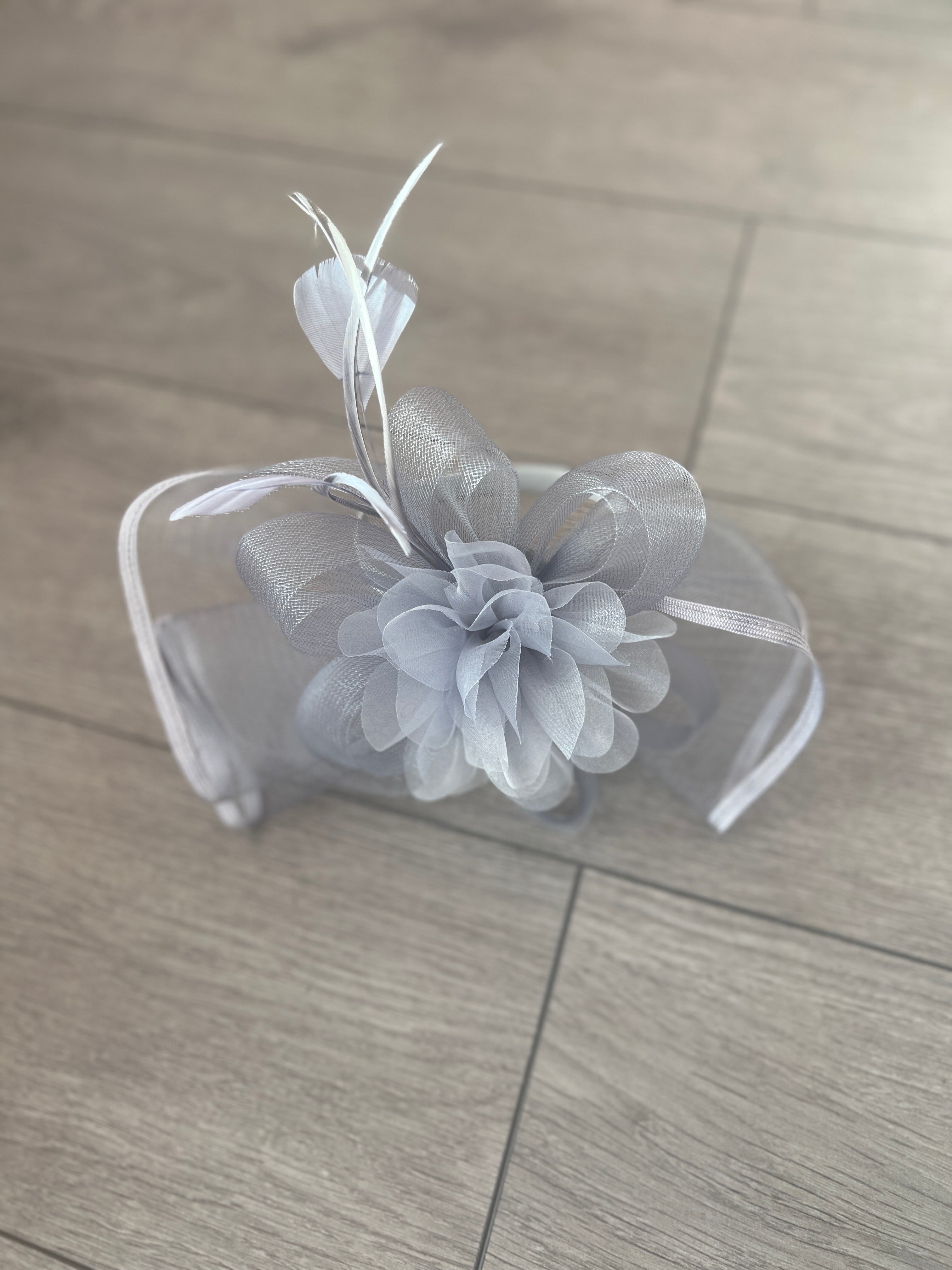 silver-fascinator-fluted-crinoline-flower