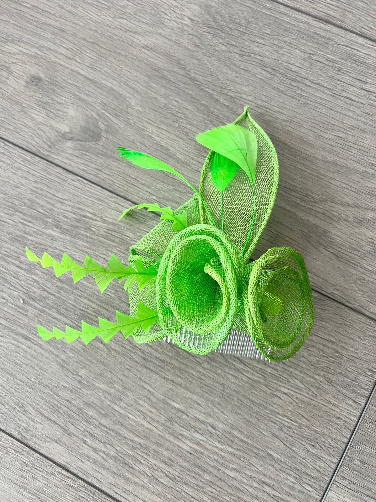 Spiralled Sinamay Light Green Fascinator on Hair Comb-Fascinators Direct