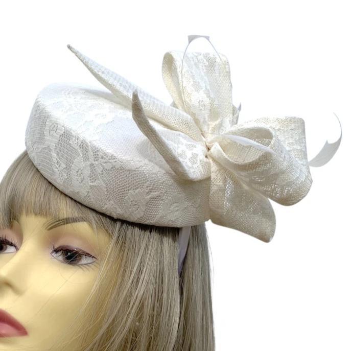 Cream pillbox hat on sale